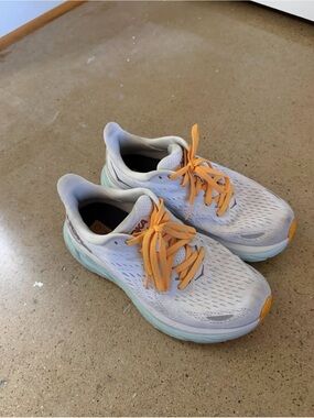 Hoka White and Mint Blue Running Shoes with Orange Laces
